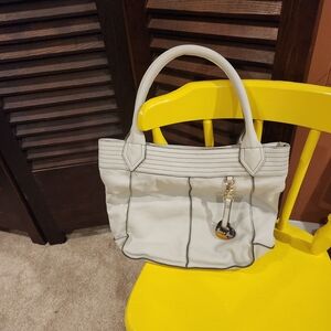 Elegant Cream Tote Bag with Charm